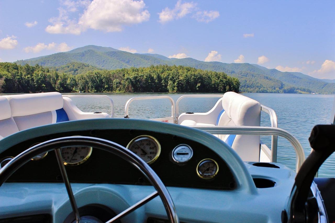 View from the helm of a pontoon on a lake