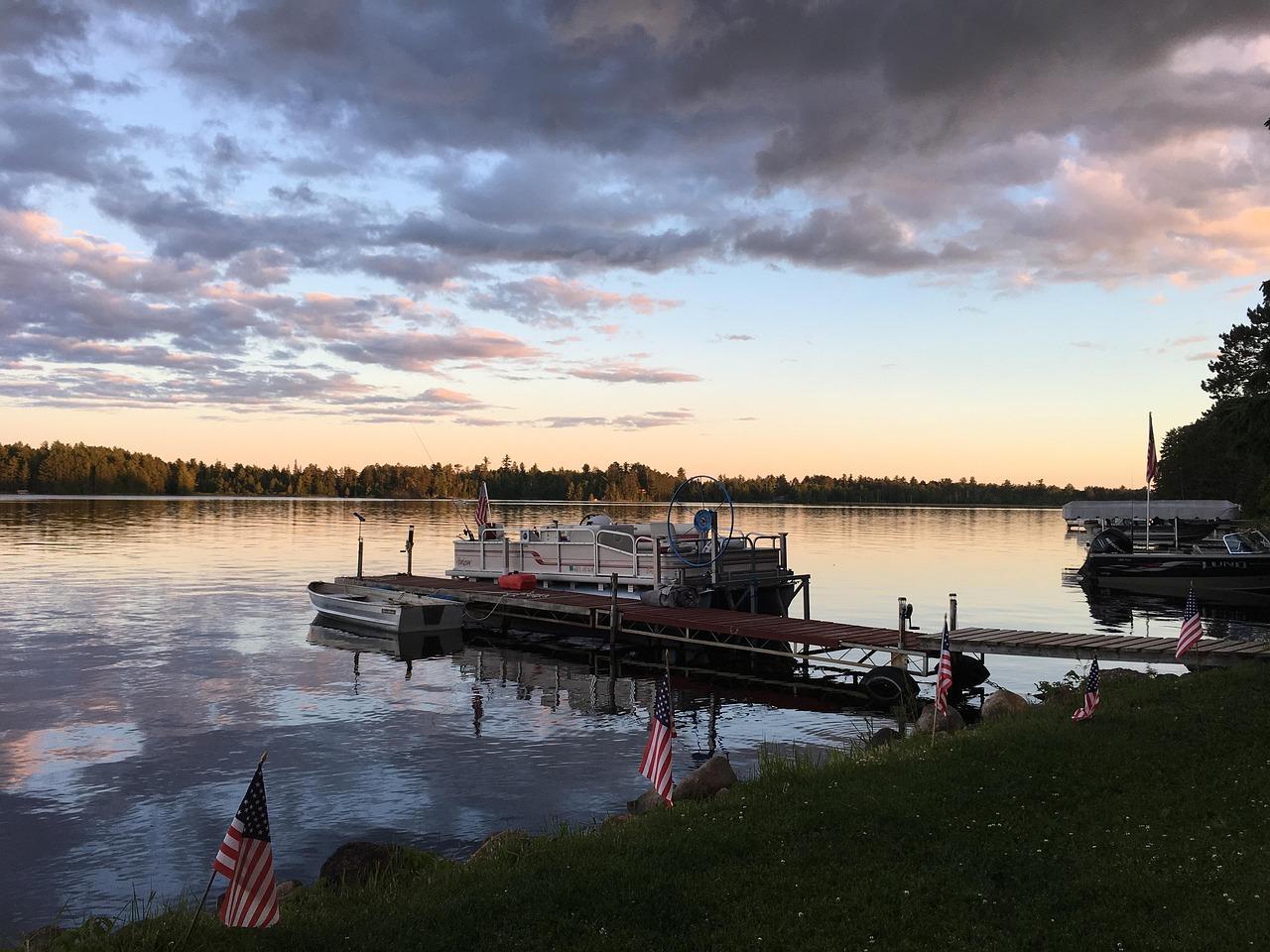 Pontoon docked at sunset on a Midwest lake