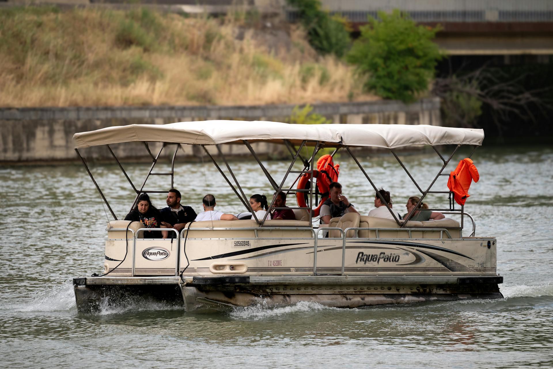 Group aboard a pontoon for a day on the water